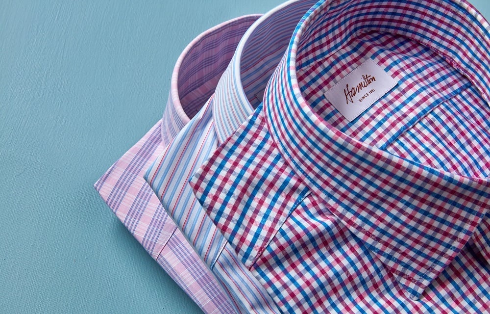 close up of three mens hamilton dress shirts checkered, striped and plaid