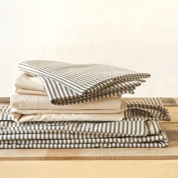 view of lawrence ticking stripe bedding bundle