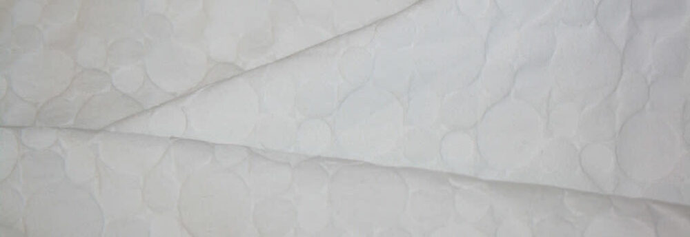 close up of cotton damask fabric